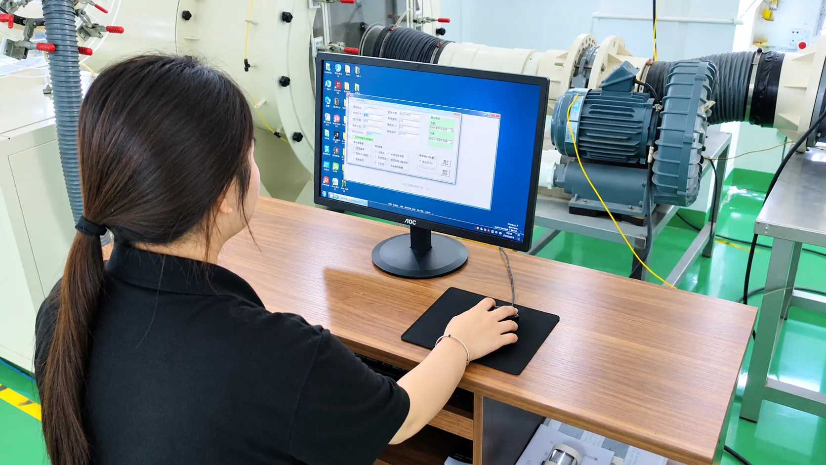 Engineer Operating Automated Wind Tunnel Data Acquisition System